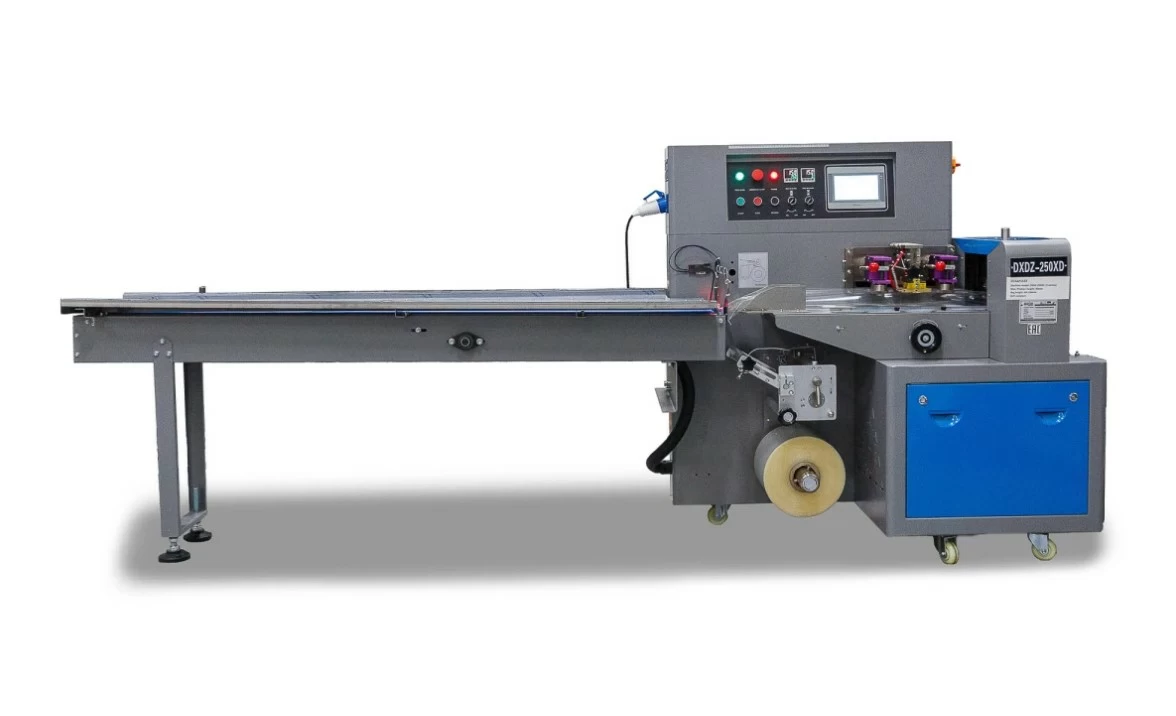 Горизонтальная упаковочная машина Hualian Machinery DXDZ-250XD (3 servo, лент. 100 мм, рег.форм., min bag L 80, H 50, 1 позиц.нож)