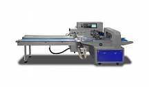 Горизонтальная упаковочная машина Hualian Machinery DXDZ-450XV (3 servo, вакуумизация, насос 100 м3/ч, лент. 200 мм, min bag L 130, H max. 100)
